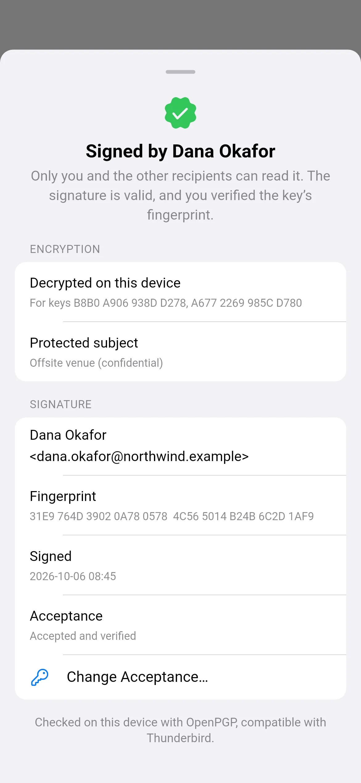 Loupe's 'Signed by Dana Okafor' sheet: decrypted on this device, a protected subject, and the key fingerprint.
